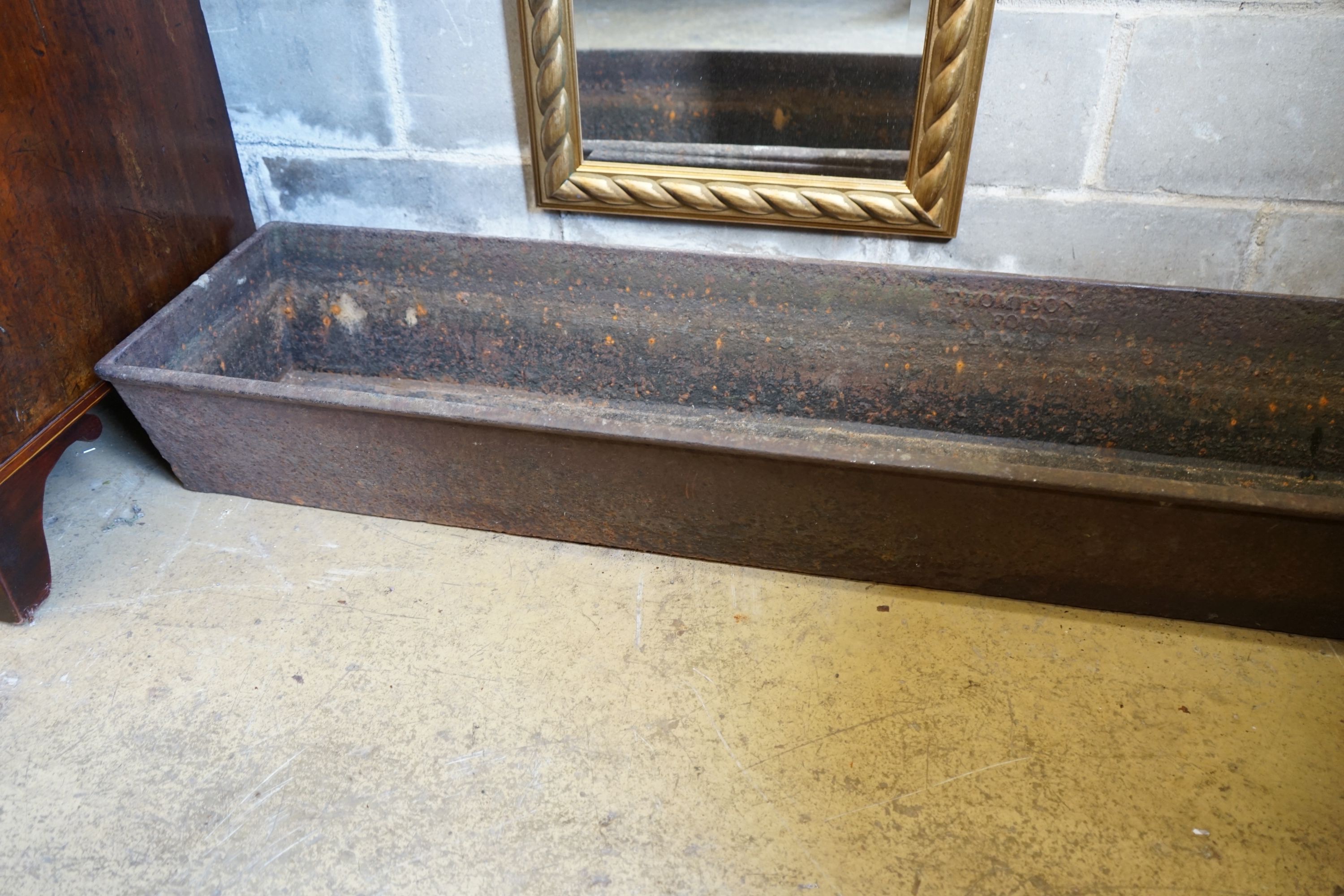 A Victorian cast iron planter trough, width 186cm depth 39cm height 20cm